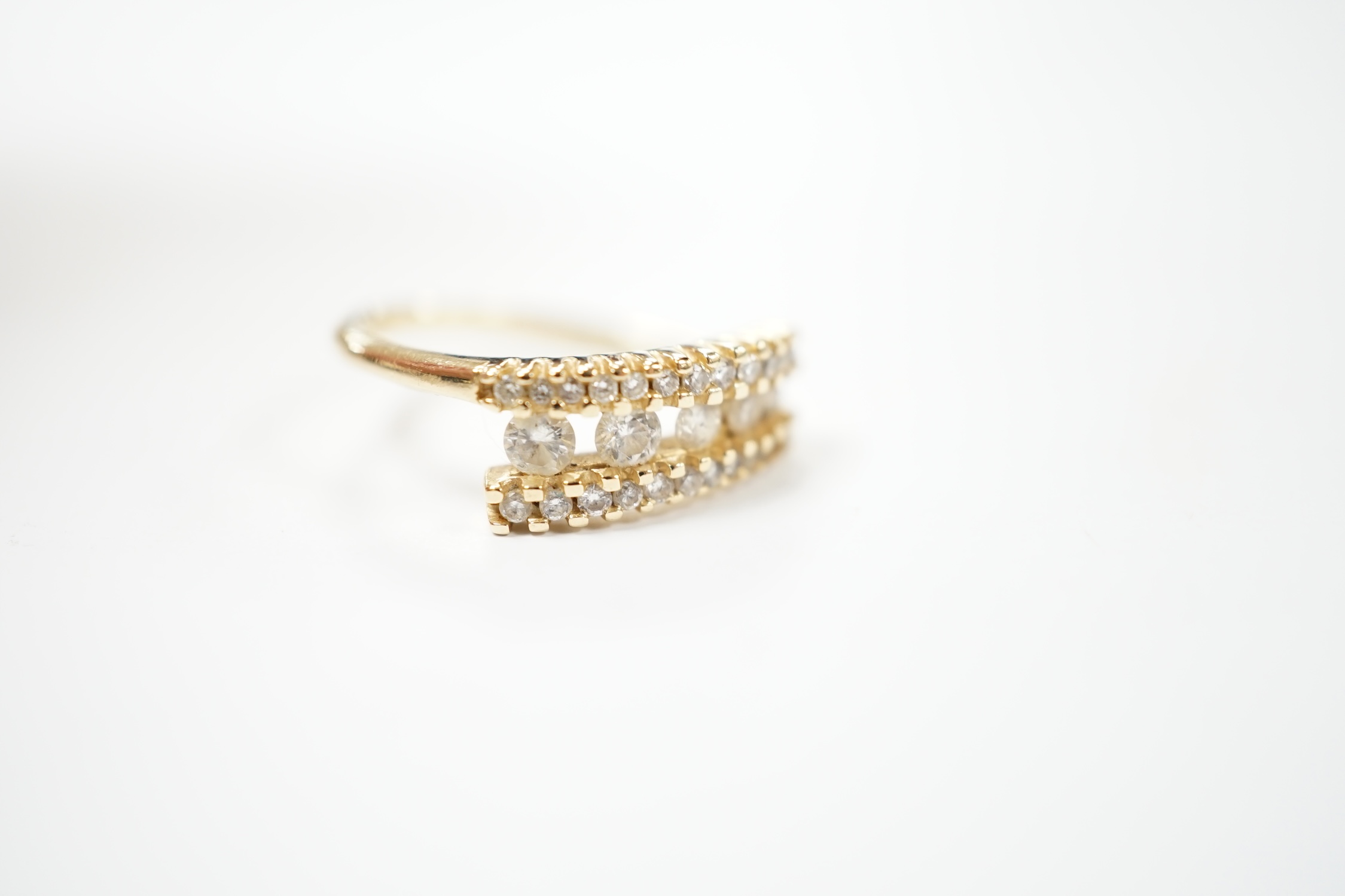 A modern 14k and diamond cluster set three row ring, size N, gross weight 3.1 grams. Condition - fair